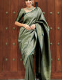 Sumptuous Dark Green Soft Silk Saree With Transcendent Blouse Piece