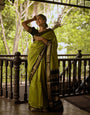 Radiant Mehndi Soft Silk Saree With Devastating Blouse Piece