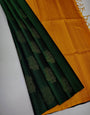 Mesmeric Dark Green Soft Silk Saree With Comely Blouse Piece