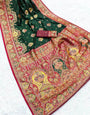 Denouement Dark Green Pashmina Saree With Tempting Blouse Piece