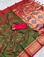 Eloquence Green Paithani Silk Saree With Beleaguer Blouse Piece