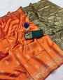 Ethnic Orange Soft Silk Saree With Splendorous Blouse Piece