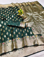 Charming Dark Green Soft Banarasi Silk Saree With Engrossing Blouse Piece