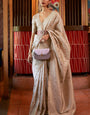Surreptitious Beige Soft Banarasi Silk Saree With Brood Blouse Piece