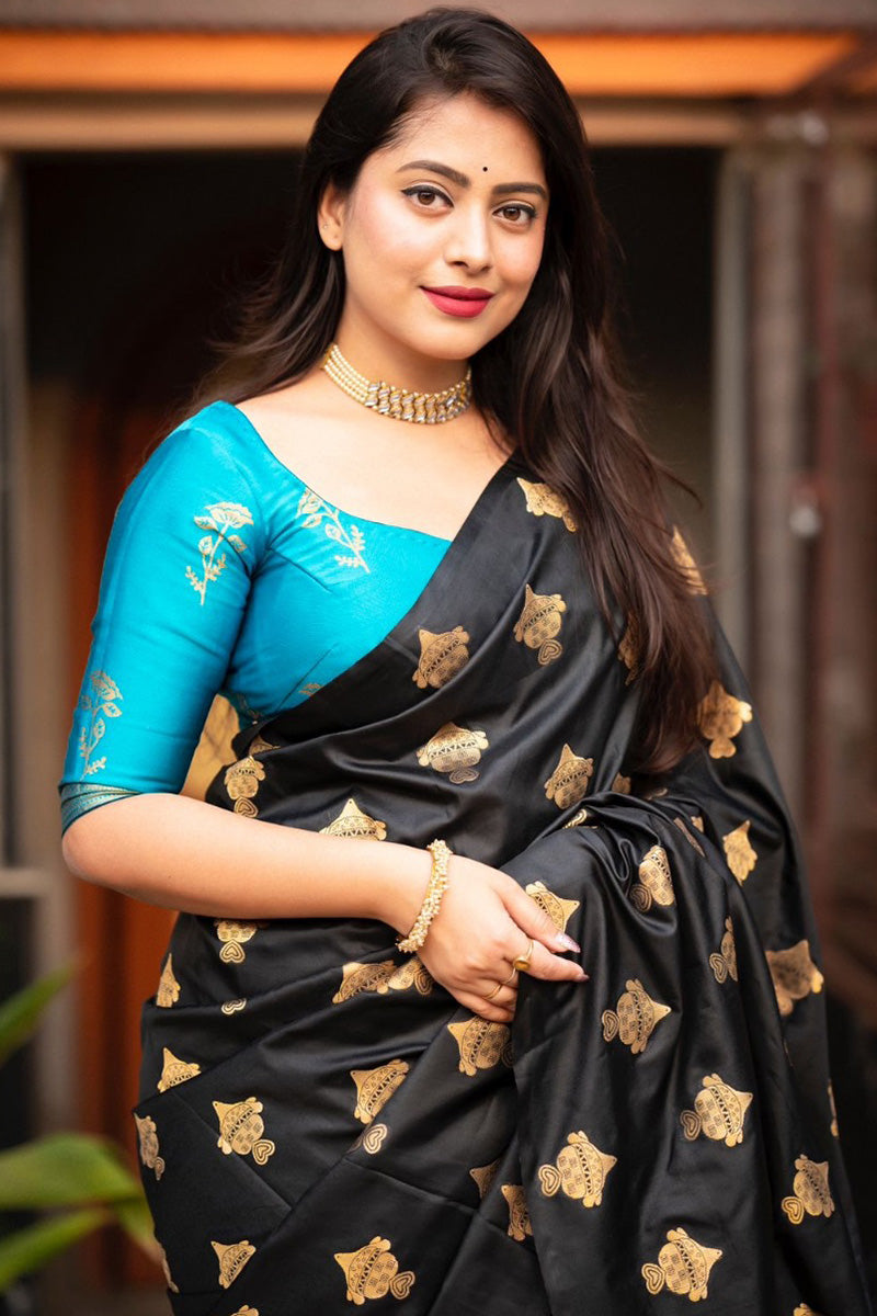 Vestigial Black and Firozi Soft Silk Saree With Radiant Blouse Piece