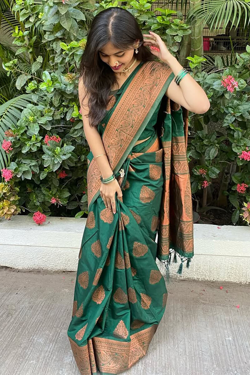 Groovy Dark Green Soft Silk Saree With Effulgent Blouse Piece