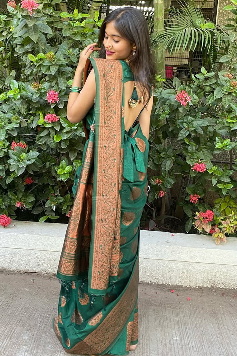Groovy Dark Green Soft Silk Saree With Effulgent Blouse Piece