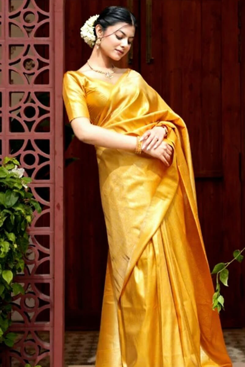 Invaluable Yellow Soft Silk Saree With Imaginative Blouse Piece