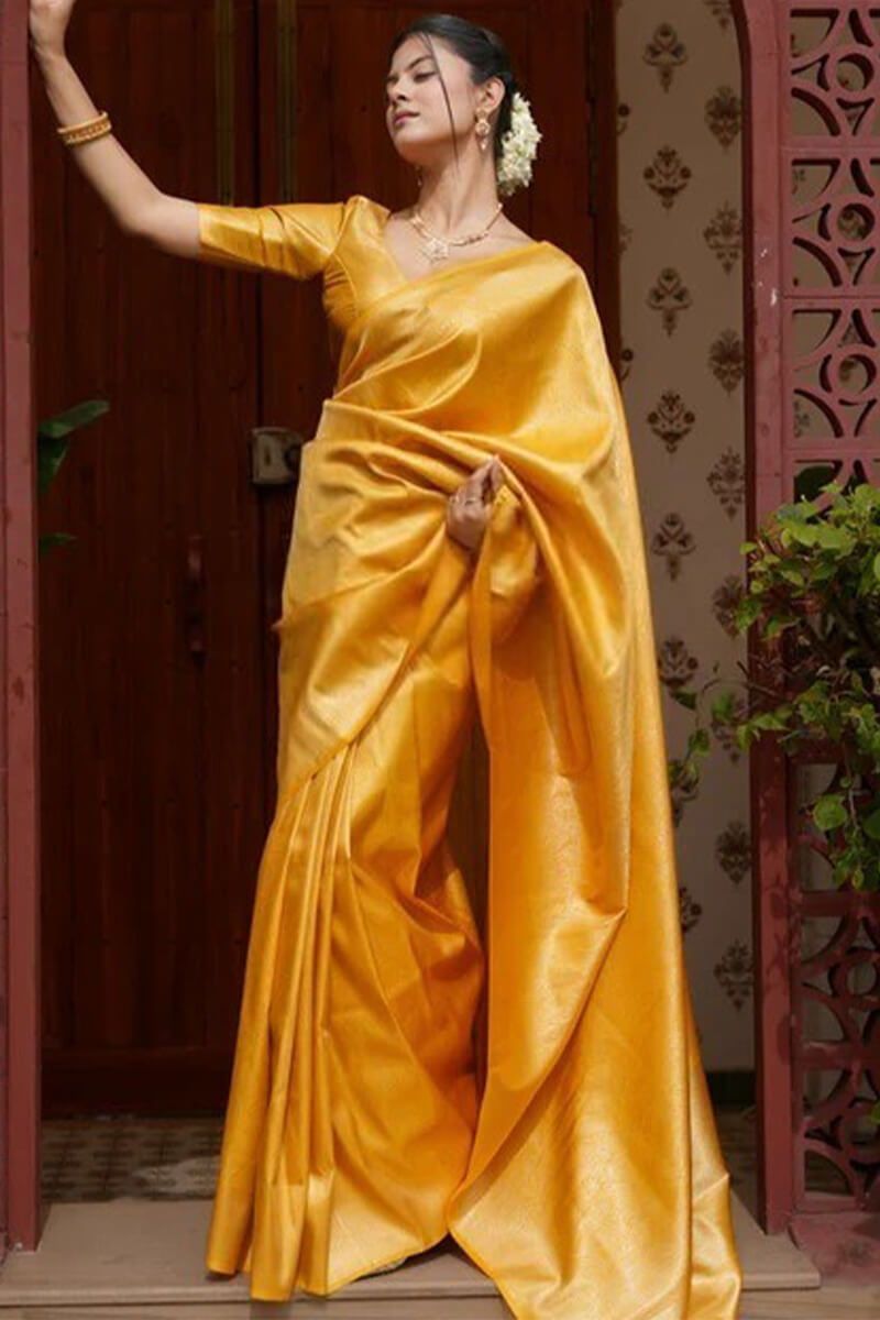 Invaluable Yellow Soft Silk Saree With Imaginative Blouse Piece
