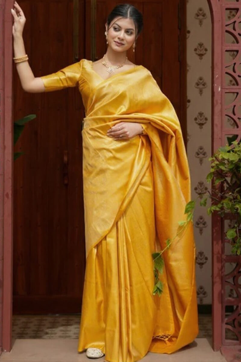 Invaluable Yellow Soft Silk Saree With Imaginative Blouse Piece