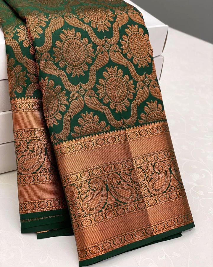 Enamoring Dark Green Soft Silk Saree With Smashing Blouse Piece