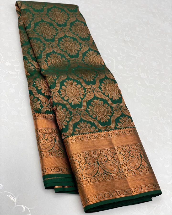 Enamoring Dark Green Soft Silk Saree With Smashing Blouse Piece