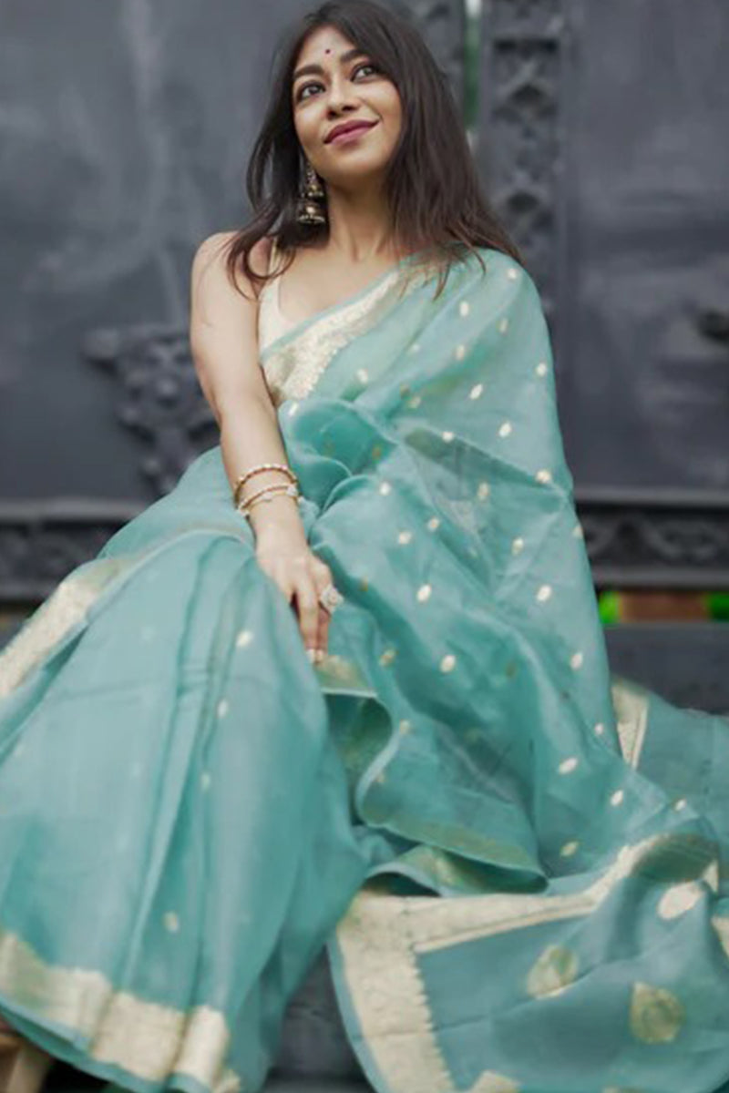 Vivacious Turquoise Linen Silk Saree With Incomparable Blouse Piece