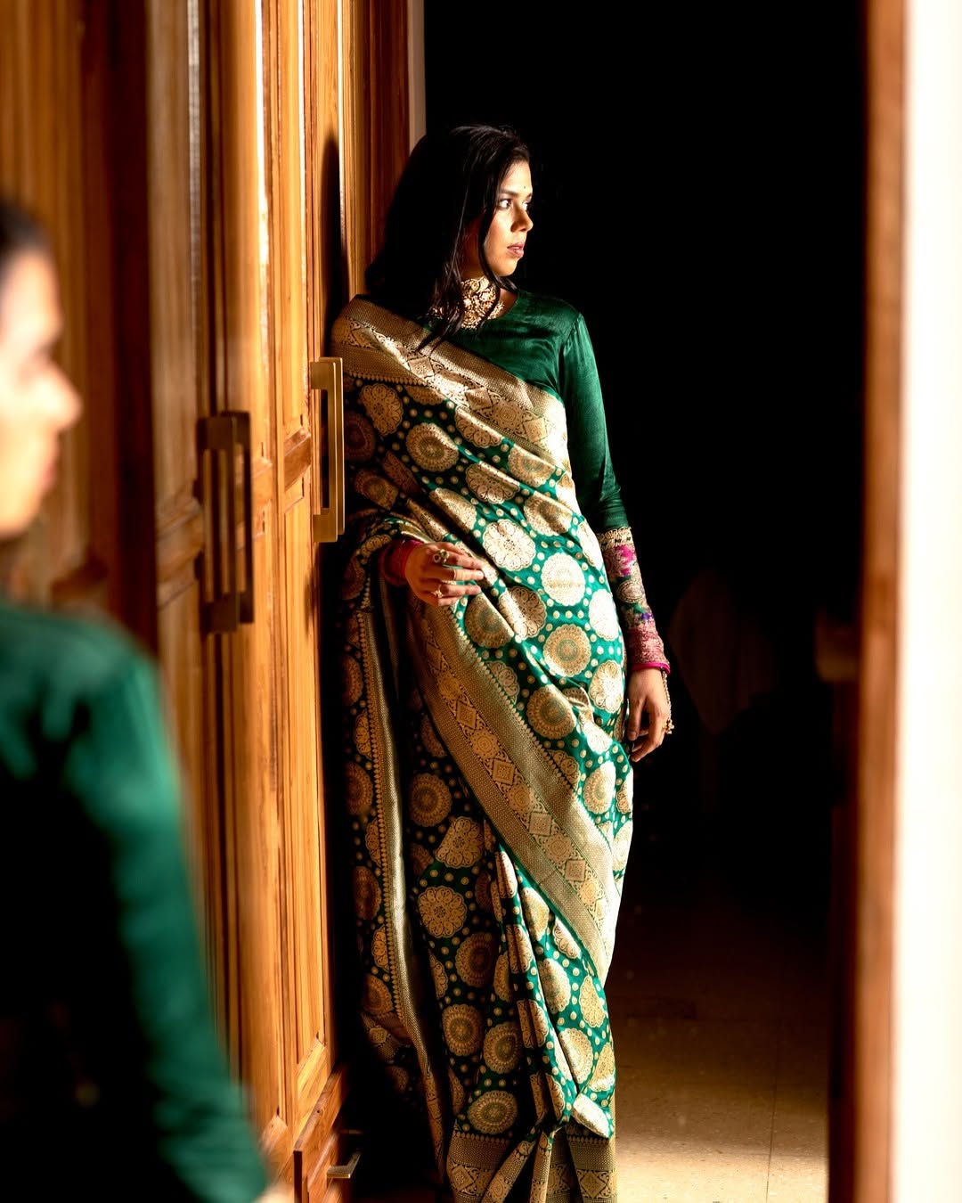 Gleaming Dark Green Soft Silk Saree With Gossamer Blouse Piece