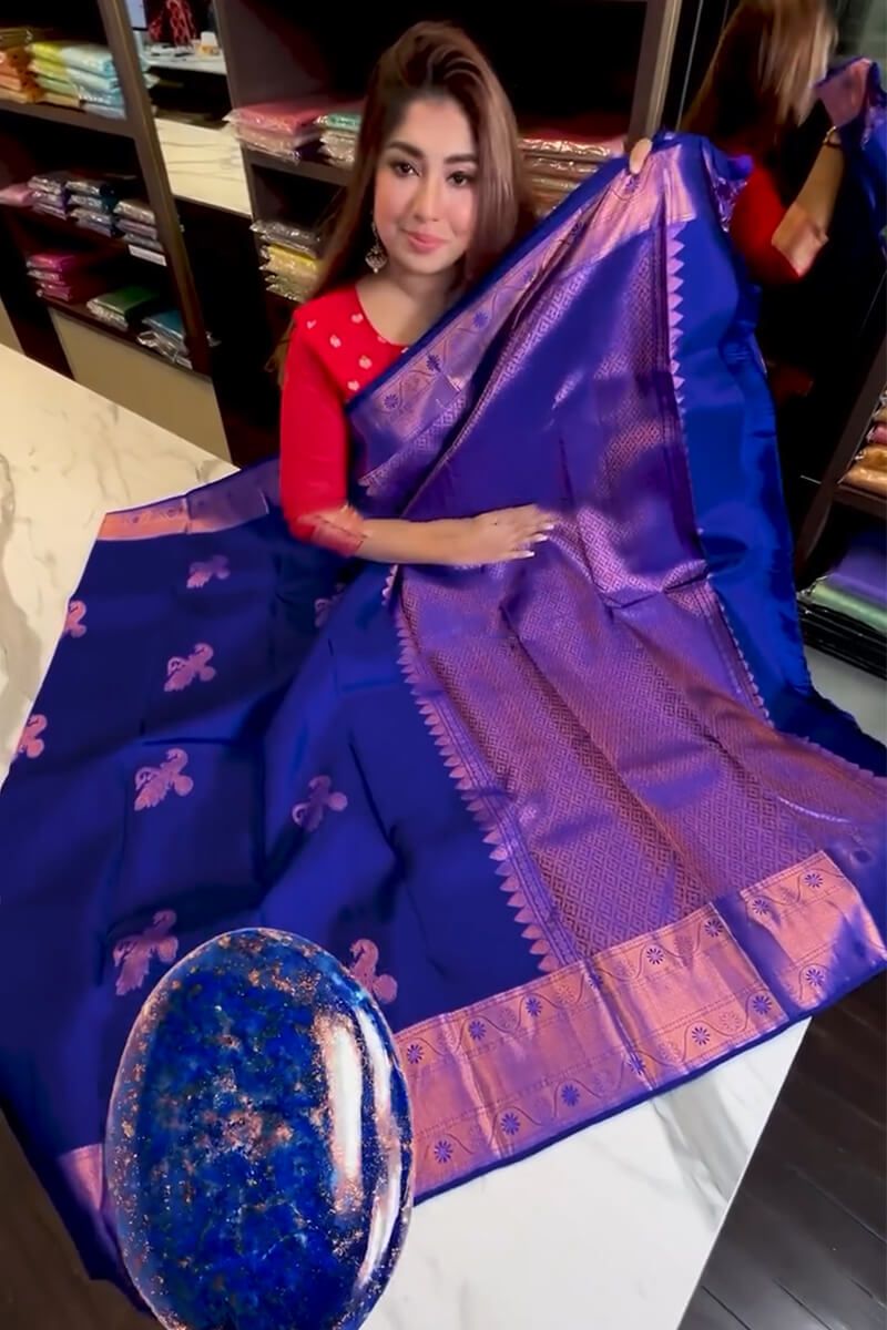 Snappy Royal Blue Soft Banarasi Silk Saree With Gossamer Blouse Piece