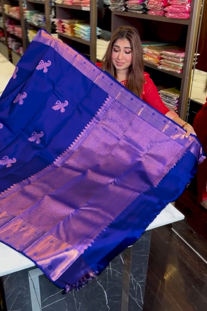 Snappy Royal Blue Soft Banarasi Silk Saree With Gossamer Blouse Piece