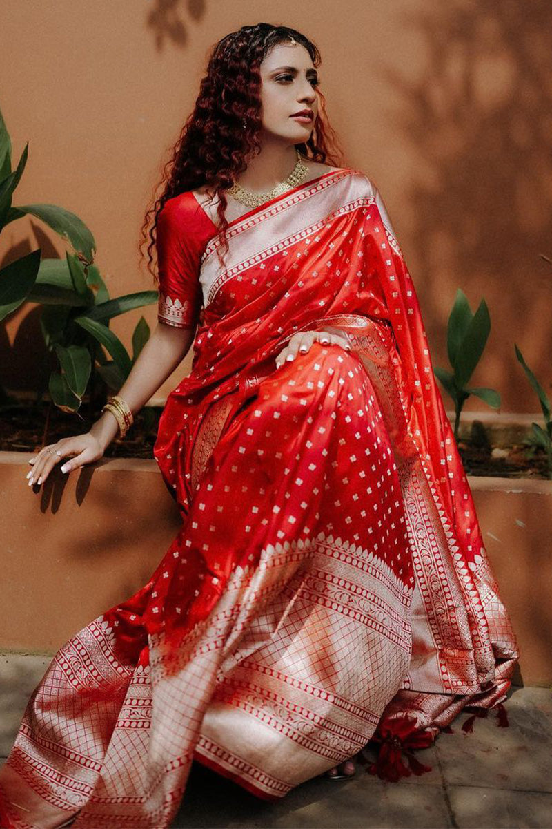 Magnificat Red Soft Silk Saree With Resonant Blouse Piece