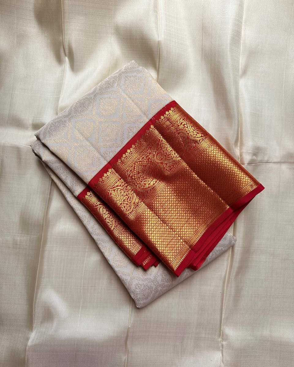 Cynosure Red Soft Silk Saree With Glamorous Blouse Piece