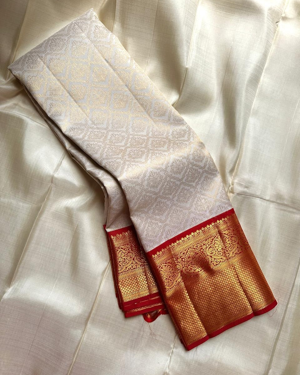 Cynosure Red Soft Silk Saree With Glamorous Blouse Piece