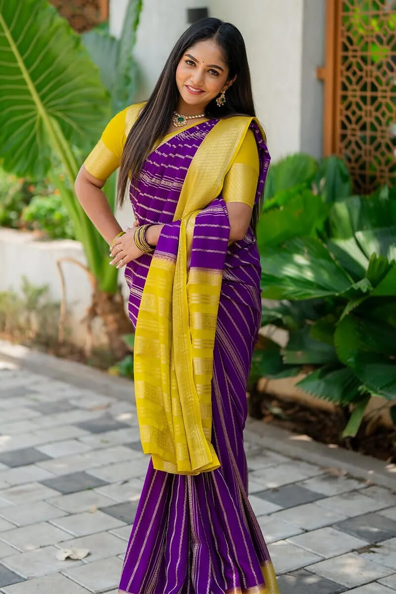 Staring Purple Soft Silk Saree With Stunner Blouse Piece
