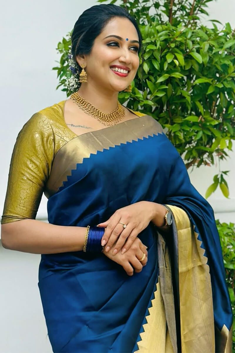 Eye-catching Navy Blue Soft Silk Saree With Vivacious Blouse Piece