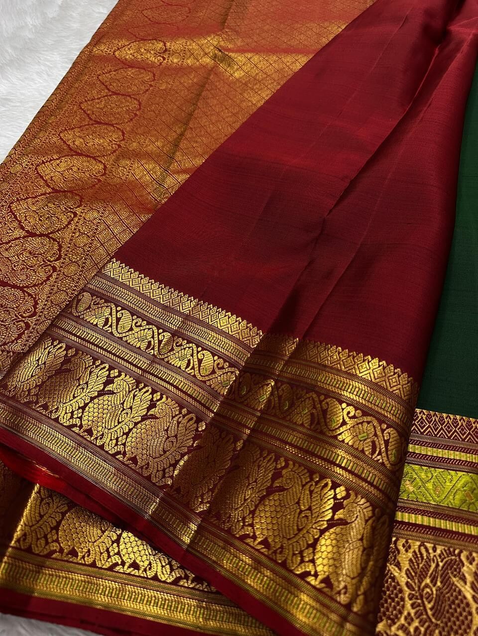 Gossamer Dark Green Soft Silk Saree With Eye-catching Blouse Piece