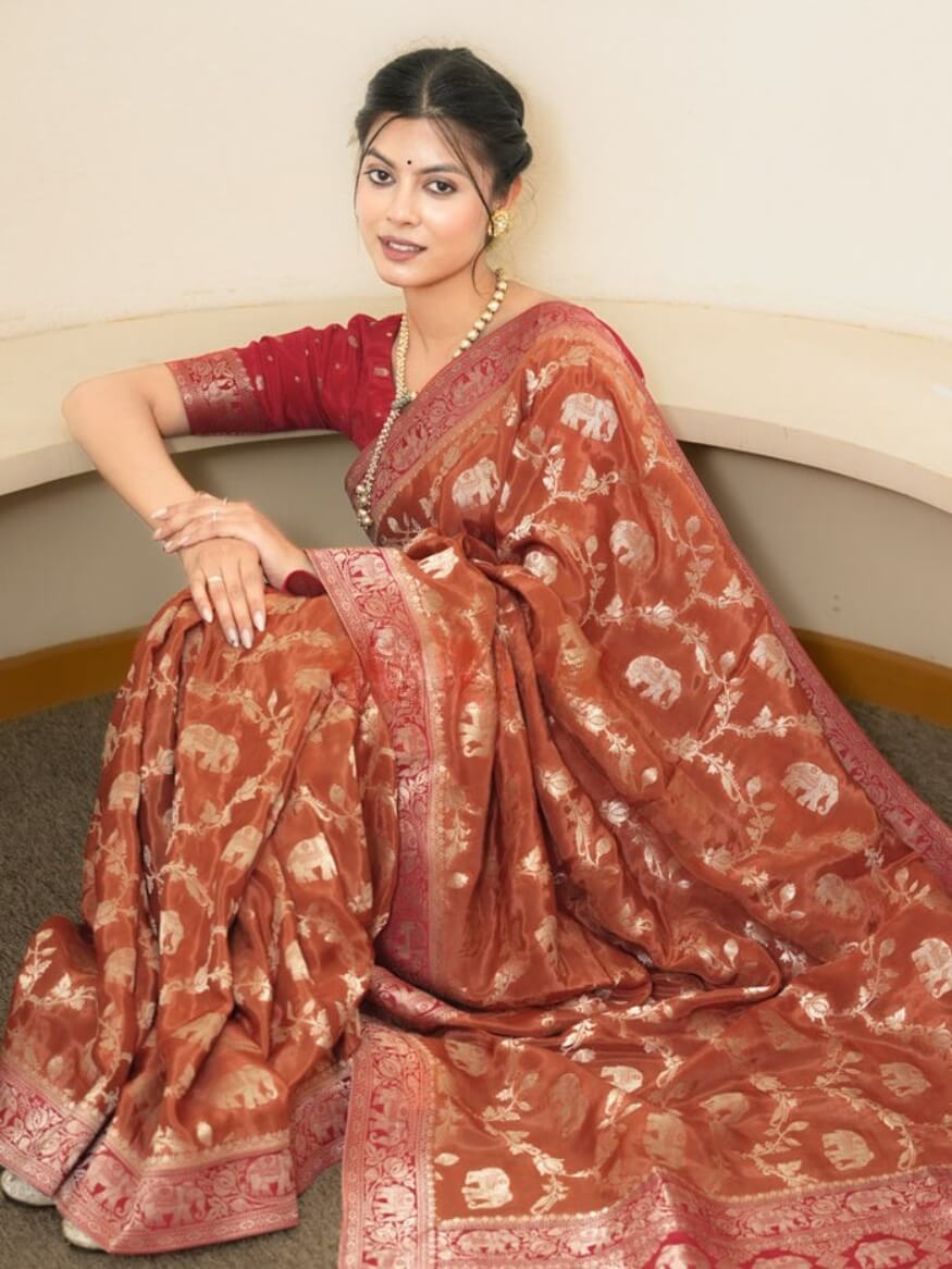 Quintessential Orange Soft Silk Saree With Jazzy Blouse Piece