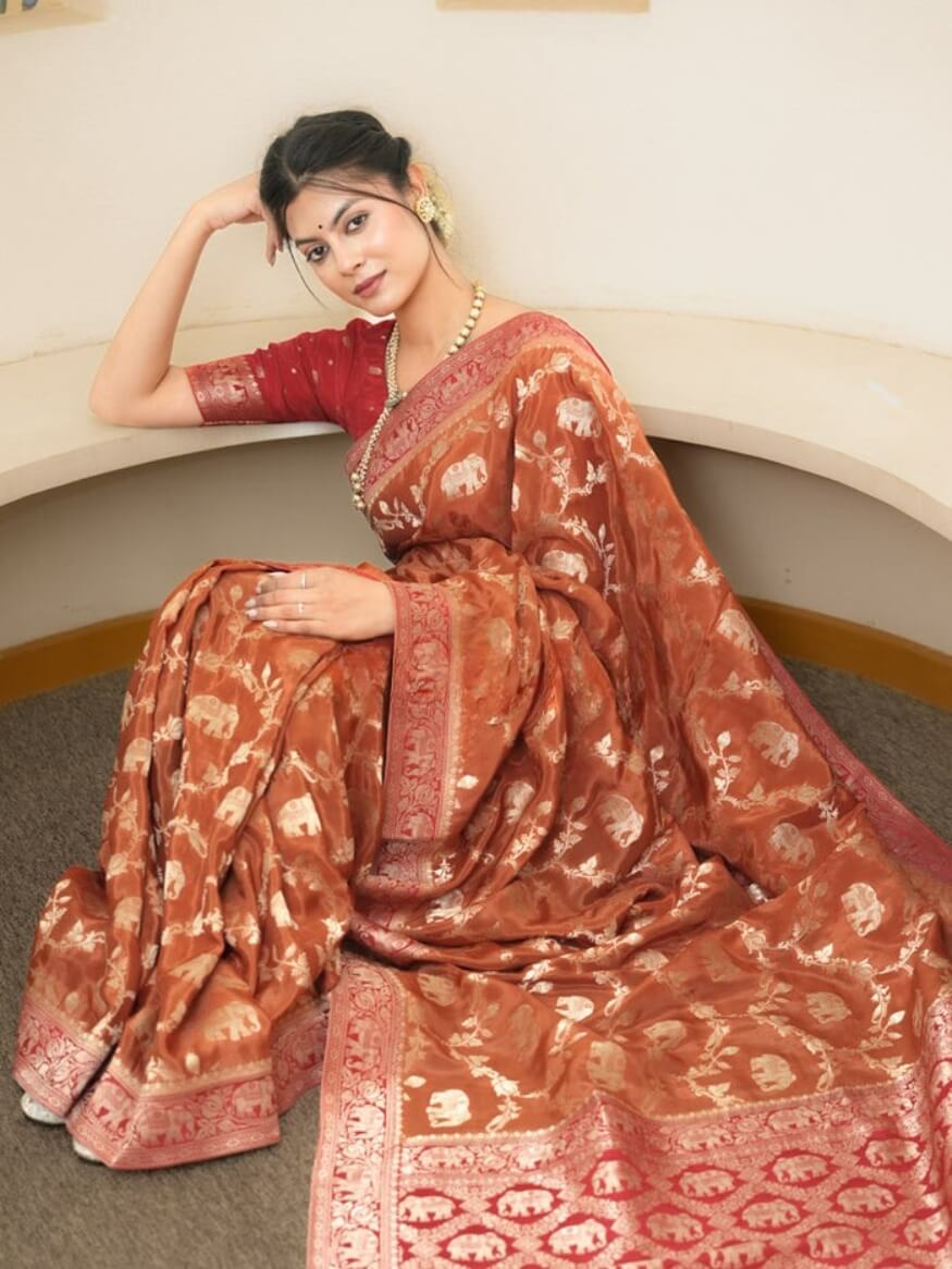 Quintessential Orange Soft Silk Saree With Jazzy Blouse Piece