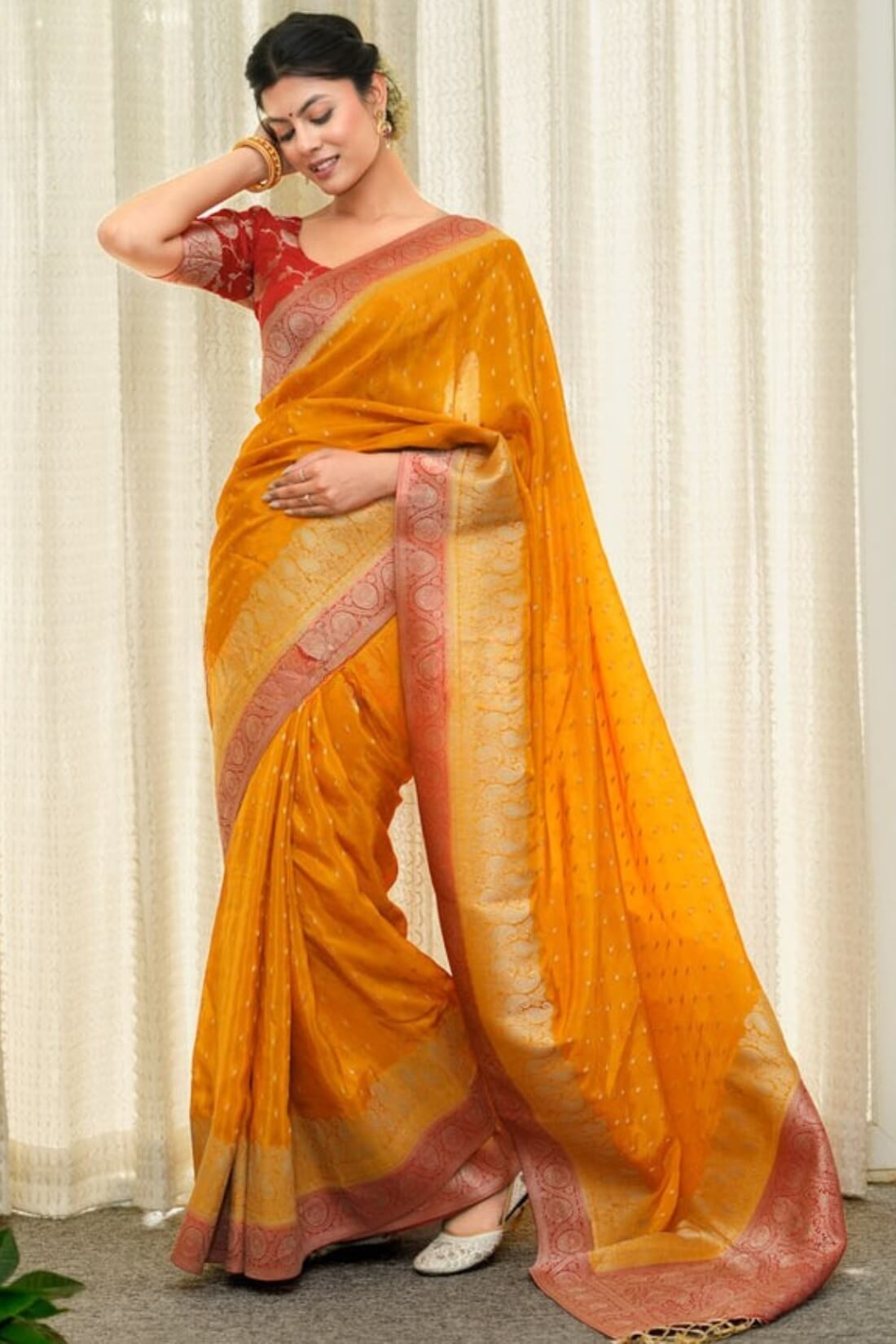 Tantalizing Orange Soft Silk Saree With Gossamer Blouse Piece