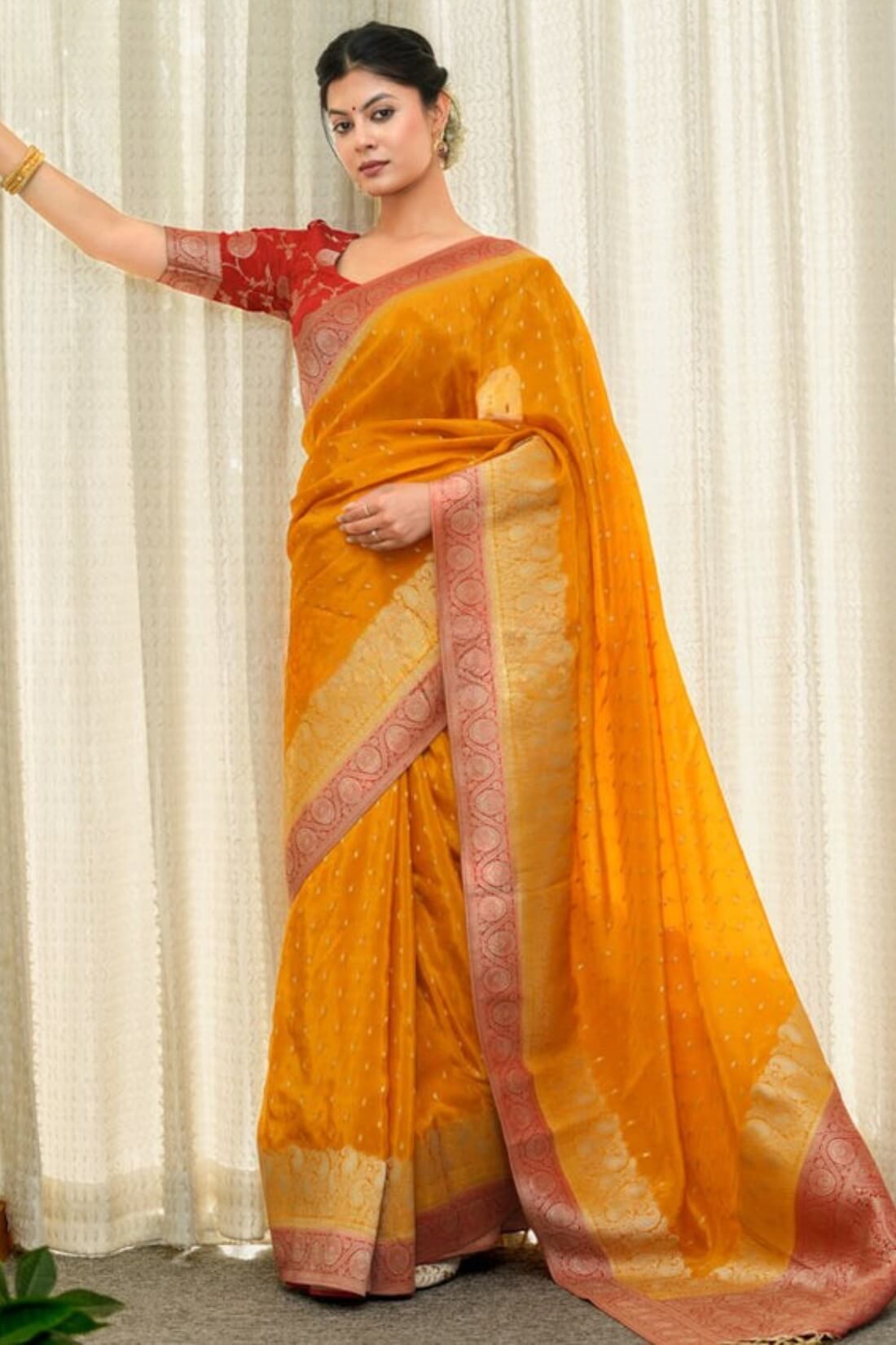 Tantalizing Orange Soft Silk Saree With Gossamer Blouse Piece