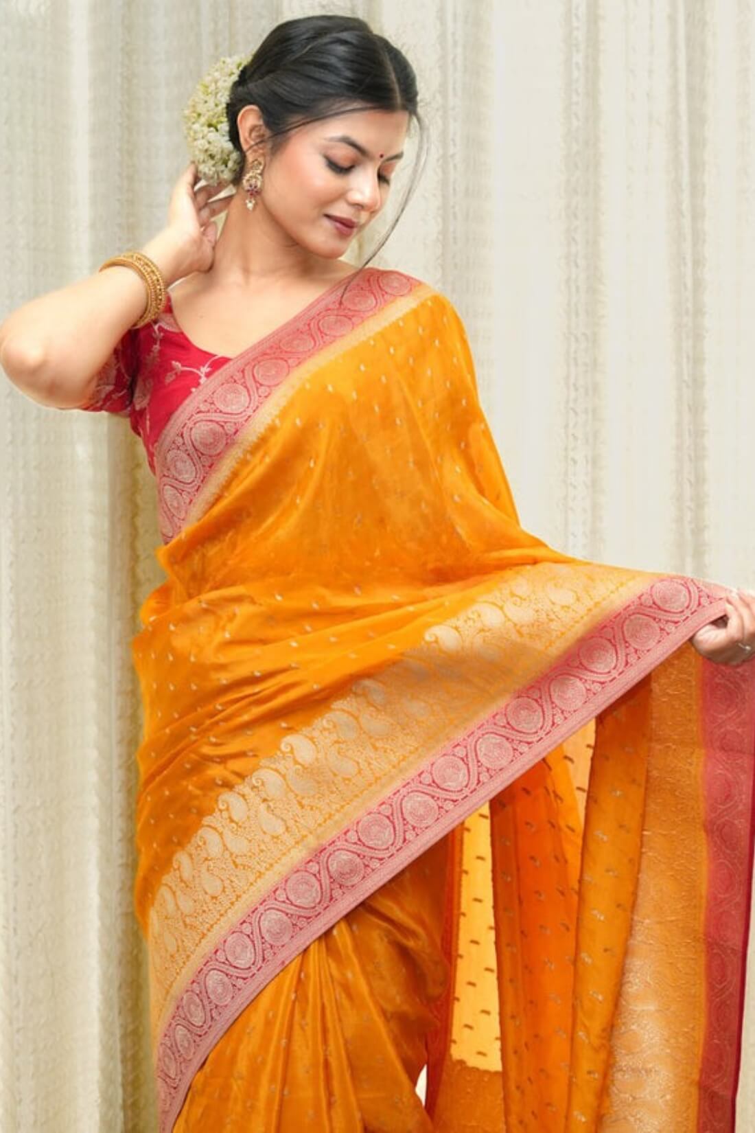 Tantalizing Orange Soft Silk Saree With Gossamer Blouse Piece