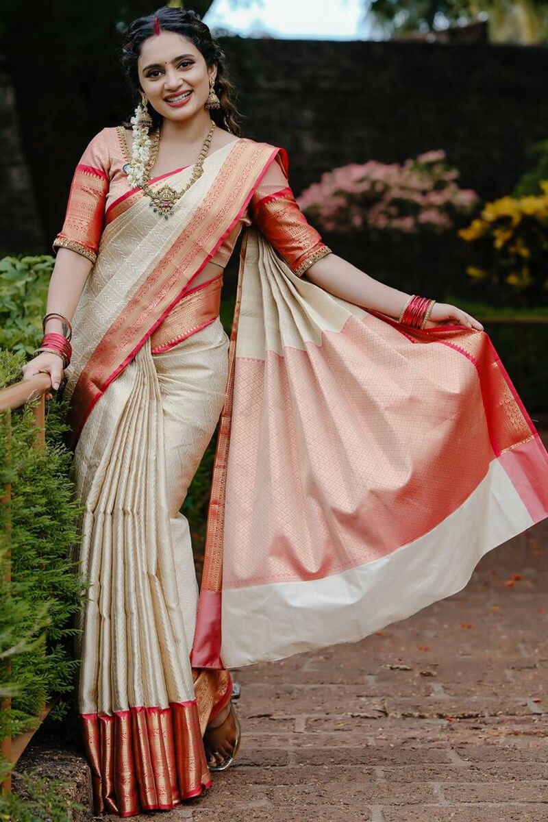 Enthralling Beige Soft Silk Saree With Resonant Blouse Piece