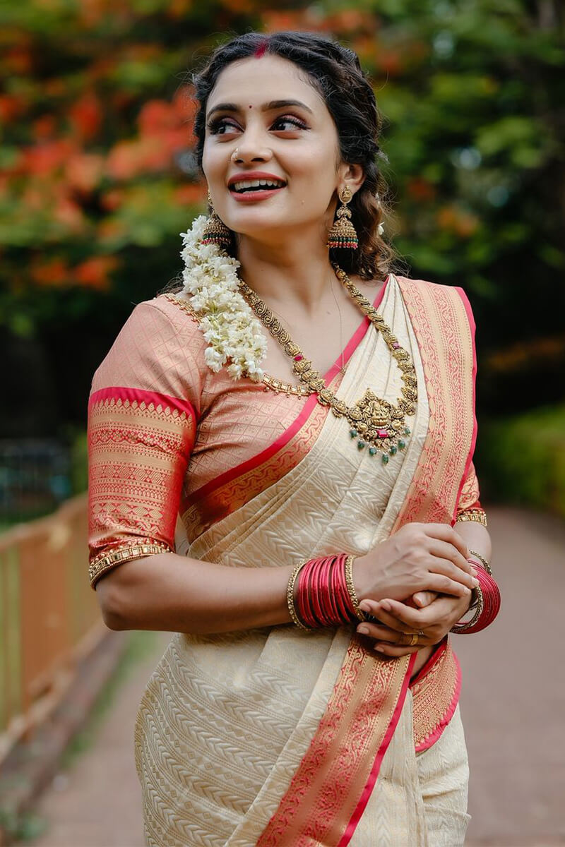 Enthralling Beige Soft Silk Saree With Resonant Blouse Piece