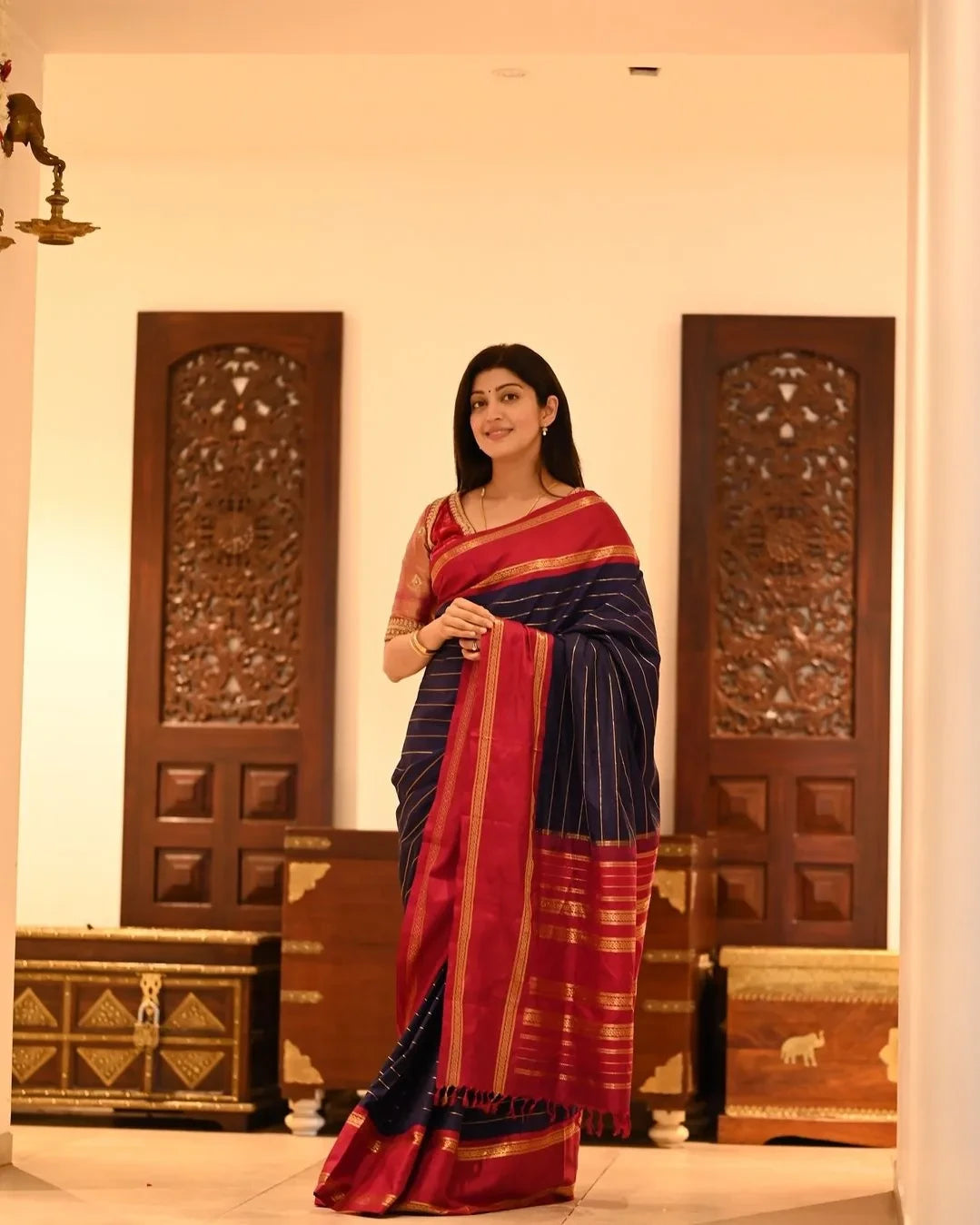 Nemesis Navy Blue Soft Silk Saree With Enticing Blouse Piece