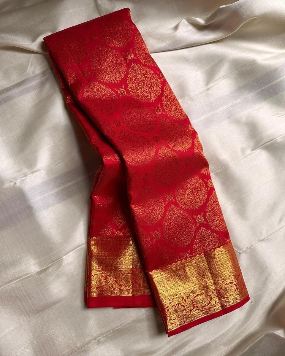 Desirable Red Soft Banarasi Silk Saree With Eye-catching Blouse Piece