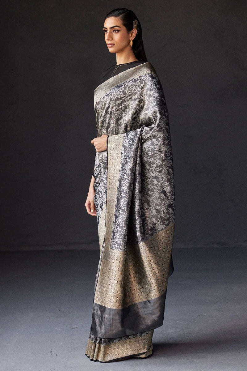 Glowing Black Soft Silk Saree With Stunning Blouse Piece