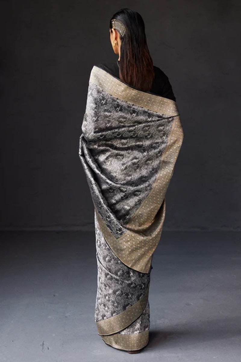 Glowing Black Soft Silk Saree With Stunning Blouse Piece