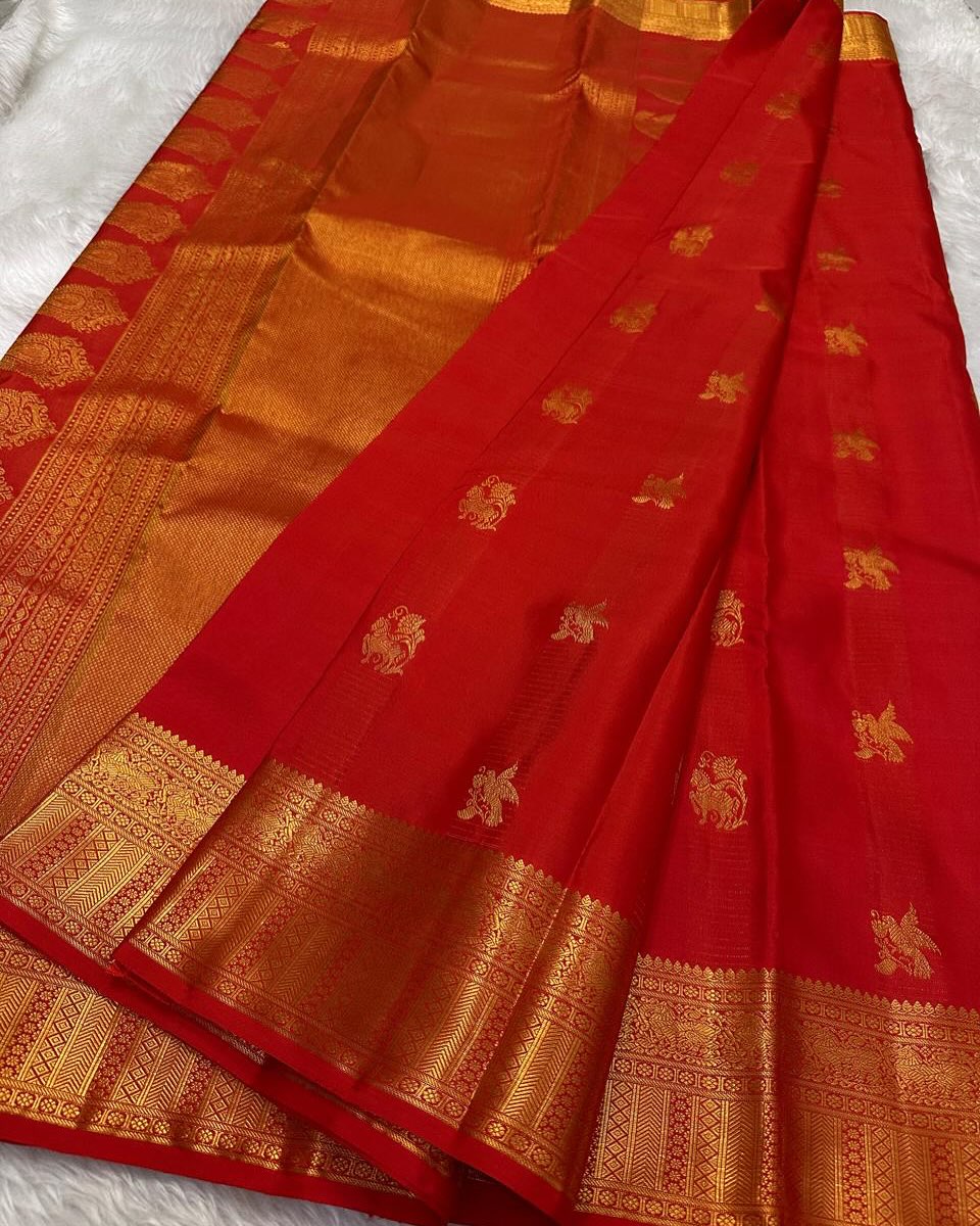 Desuetude Red Soft Banarasi Silk Saree With Sempiternal Blouse Piece