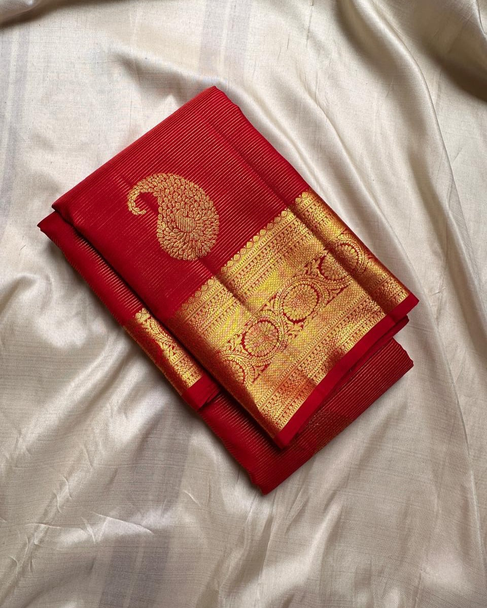 Eye-catching Red Soft Banarasi Silk Saree With Blissful Blouse Piece
