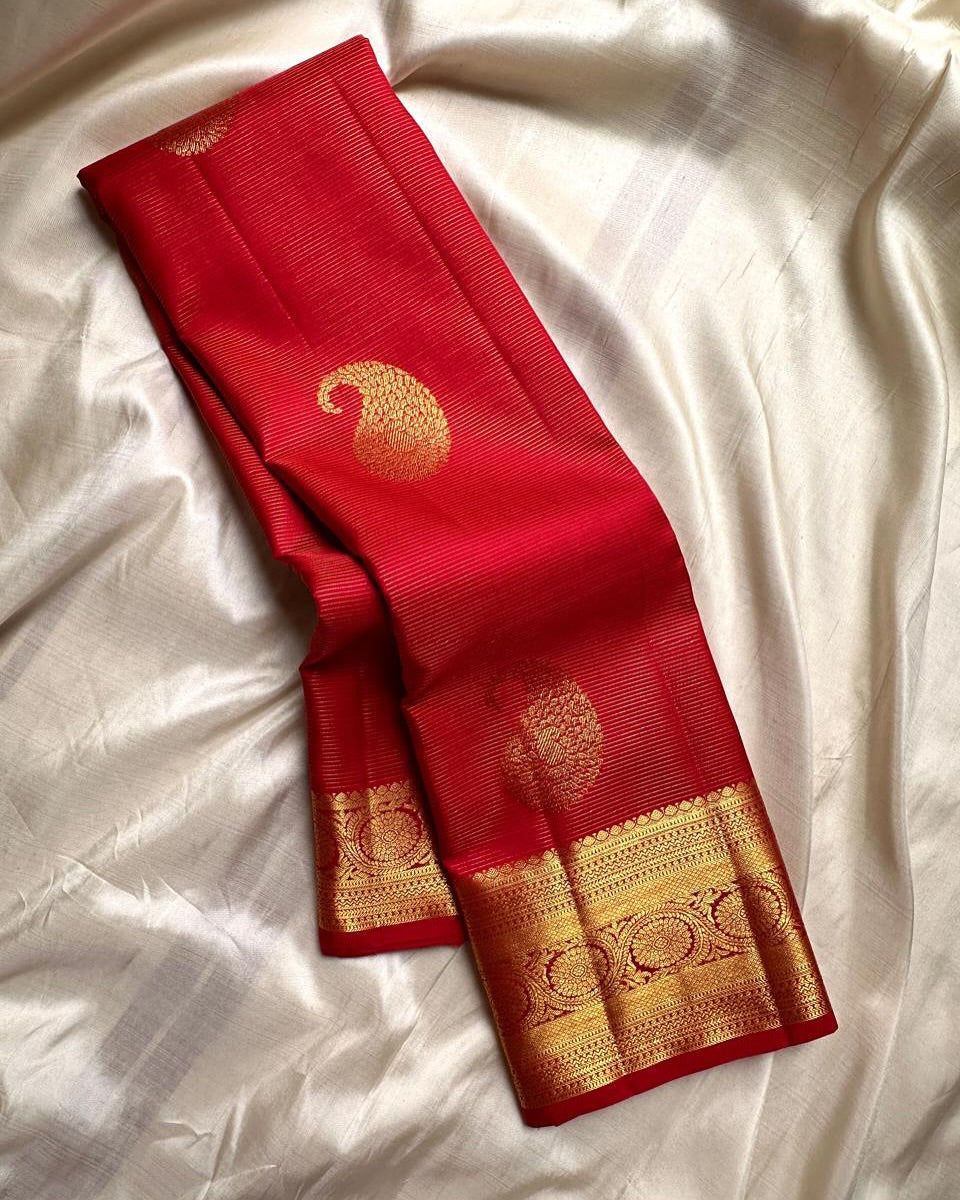 Eye-catching Red Soft Banarasi Silk Saree With Blissful Blouse Piece