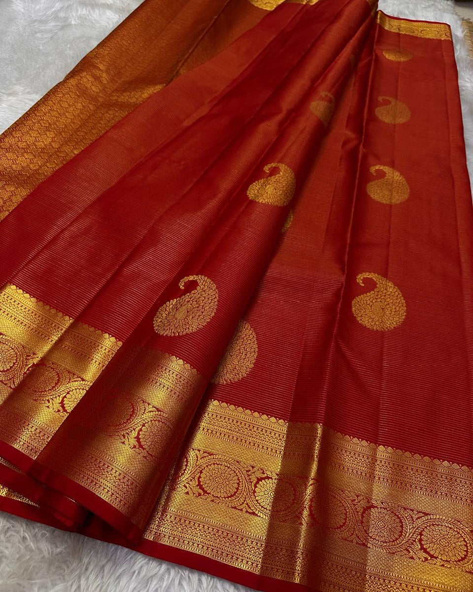 Eye-catching Red Soft Banarasi Silk Saree With Blissful Blouse Piece