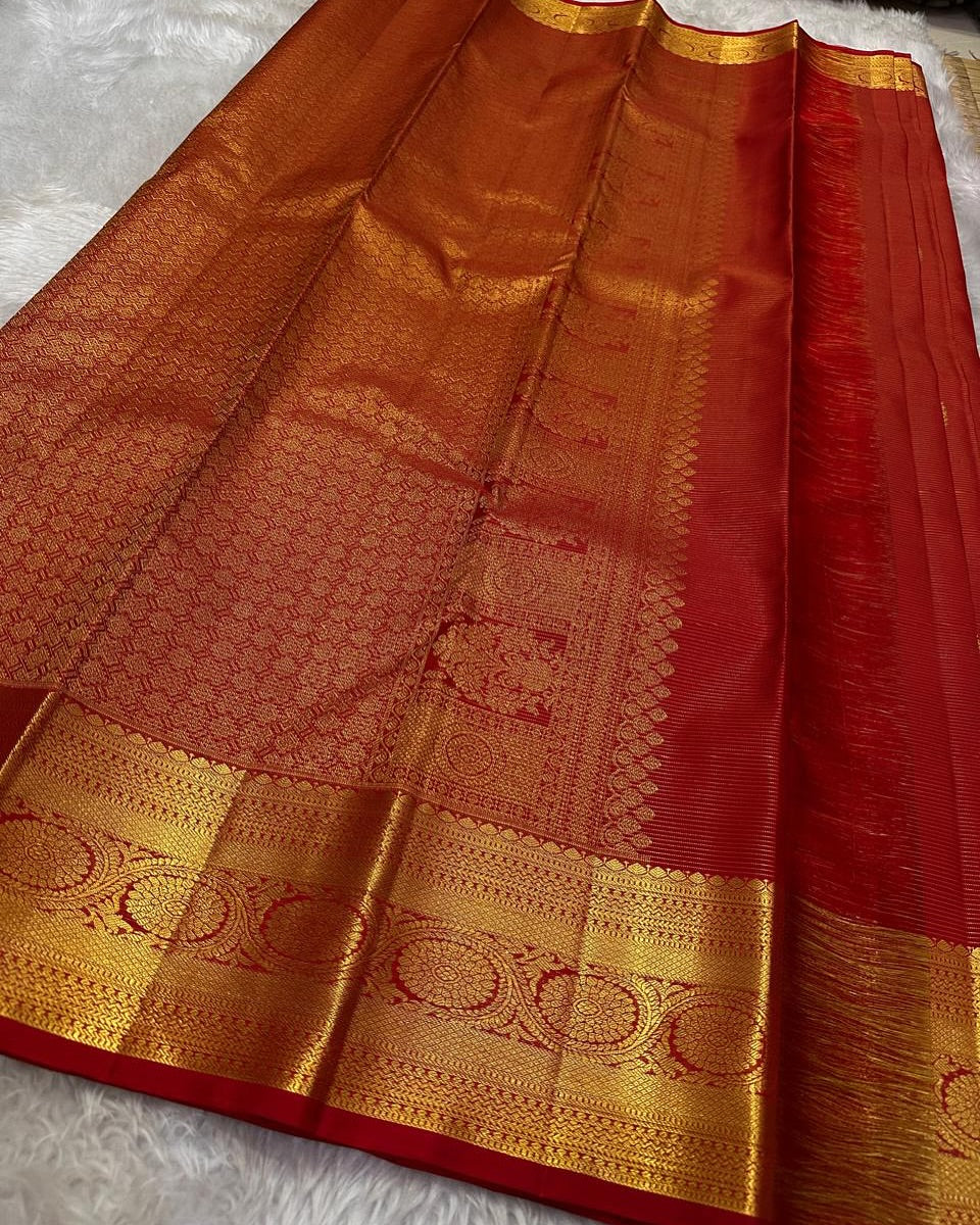 Eye-catching Red Soft Banarasi Silk Saree With Blissful Blouse Piece