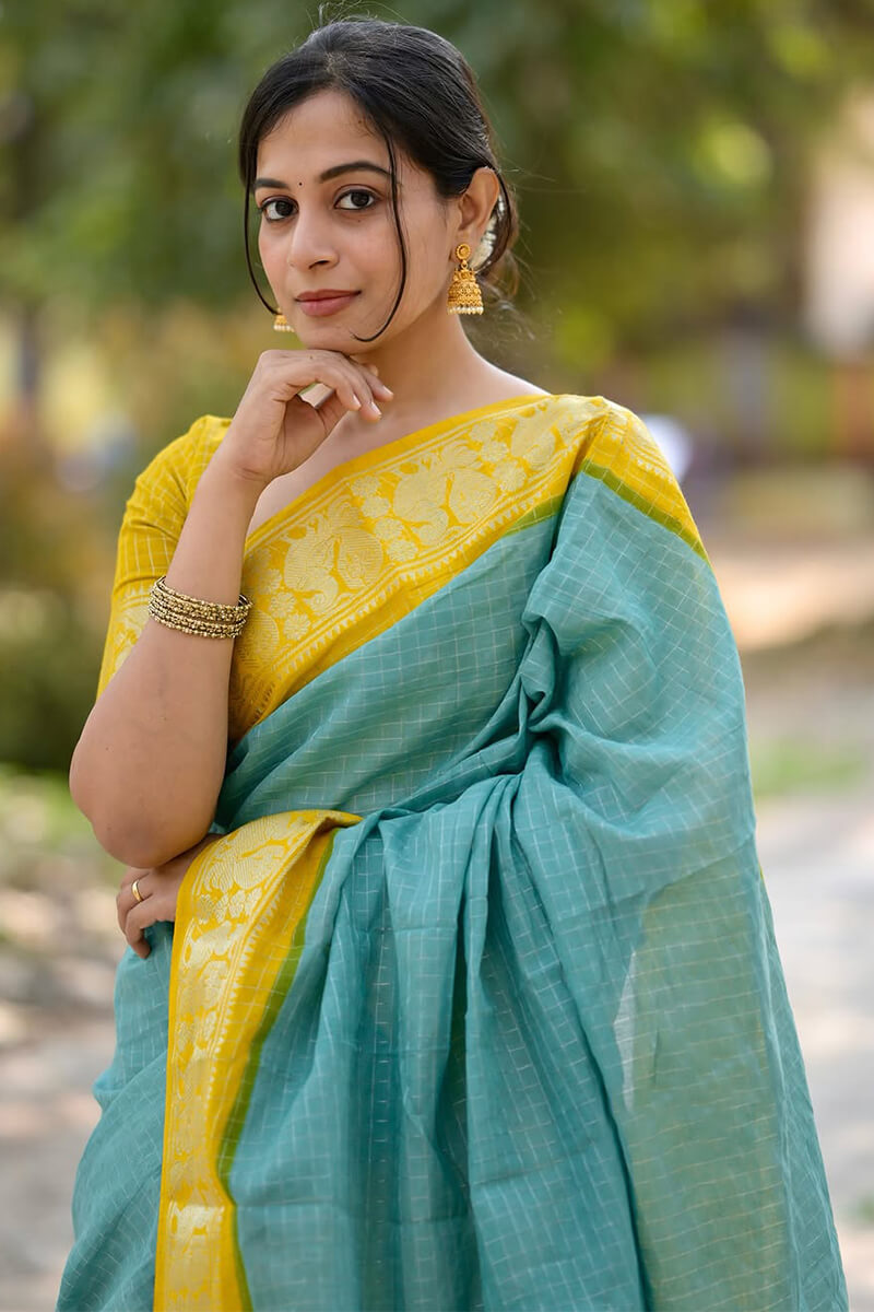Luxuriant Firozi Soft Silk Saree With Devastating Blouse Piece