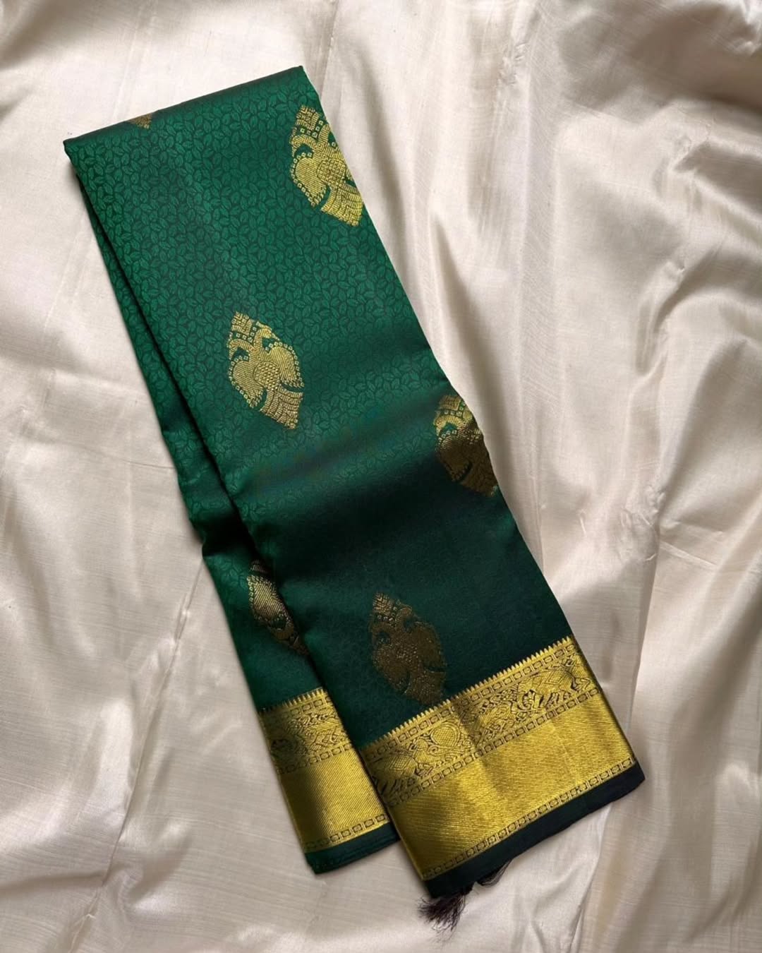 Appealing Dark Green Soft Banarasi Silk Saree With Charming Blouse Piece