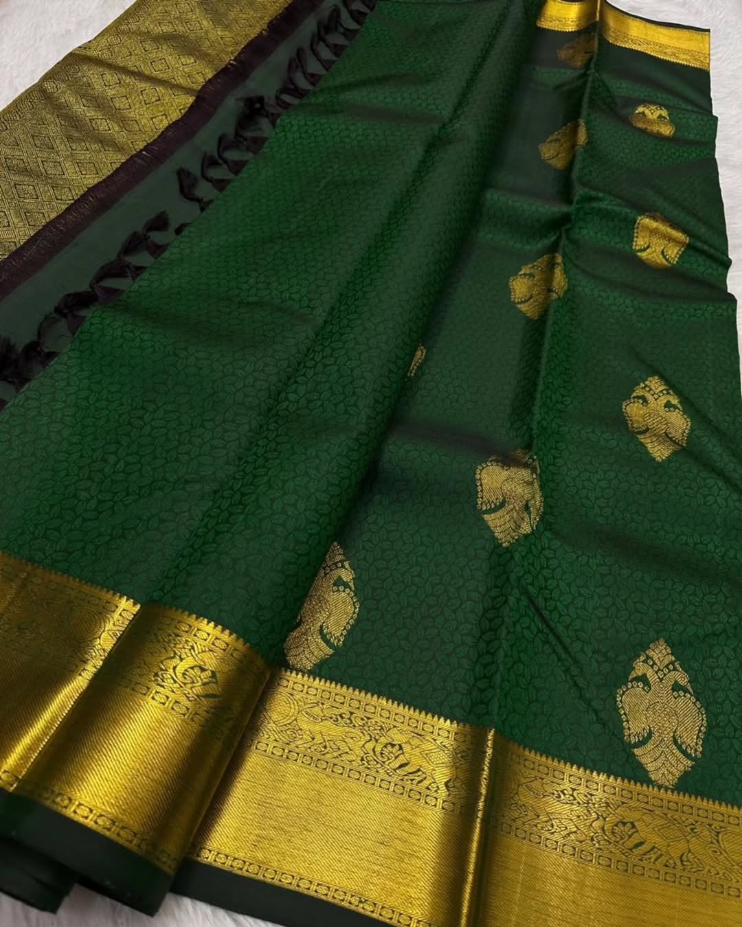 Appealing Dark Green Soft Banarasi Silk Saree With Charming Blouse Piece