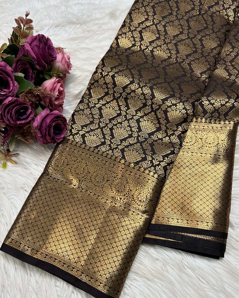 Adorning Black Soft Banarasi Silk Saree With Fantabulous Blouse Piece
