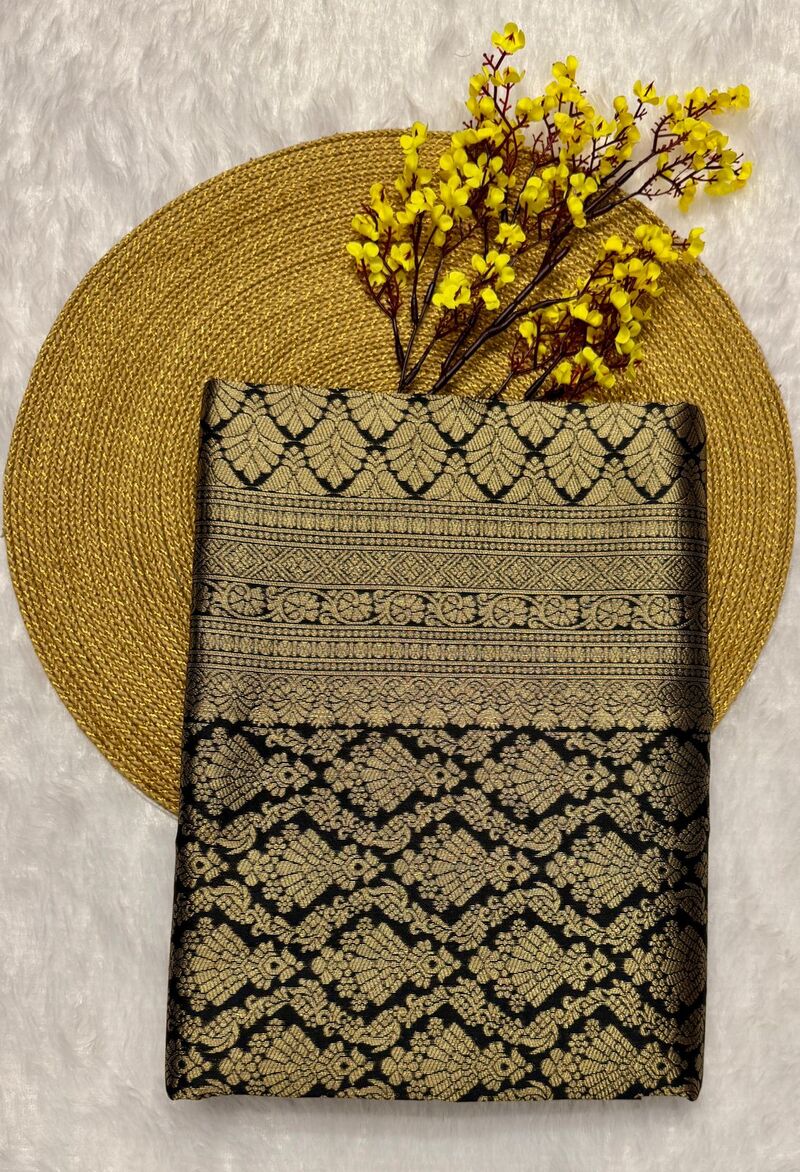 Adorning Black Soft Banarasi Silk Saree With Fantabulous Blouse Piece