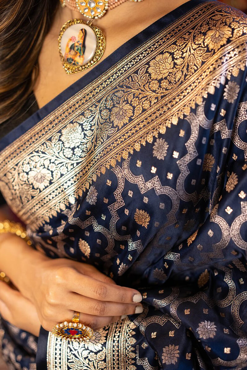 Hypnotic Navy Blue Soft Banarasi Silk Saree With Intricate Blouse Piece