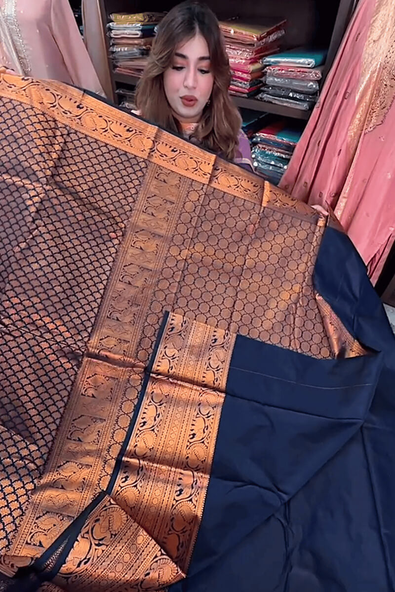 Mesmeric Navy Blue Soft Banarasi Silk Saree With Fairytale Blouse Piece