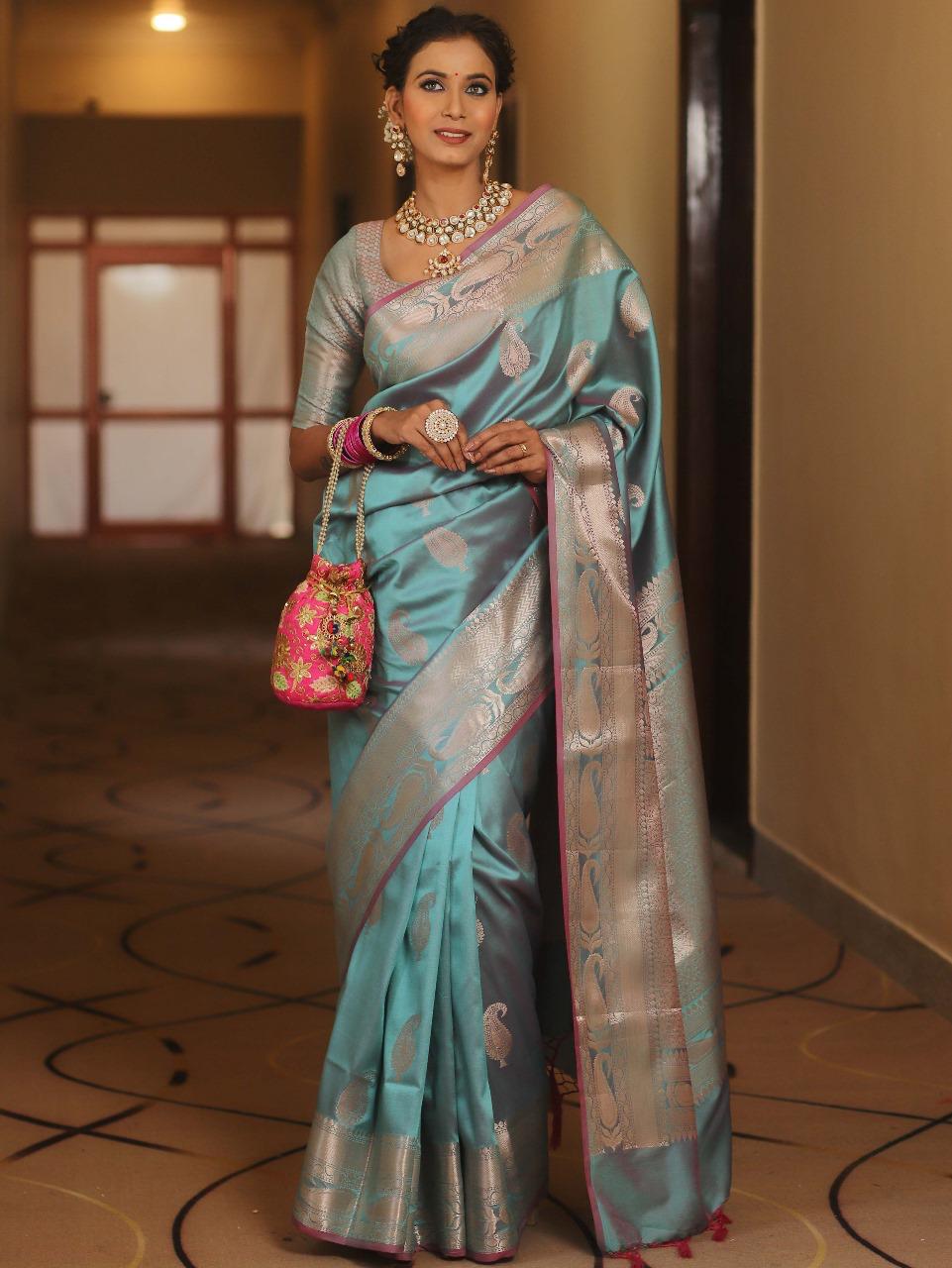 Traditional Firozi Soft Banarasi Silk Saree With Bucolic Blouse Piece